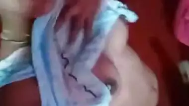 XXX selfie of young Desi woman who pulls nightgown up to show tits