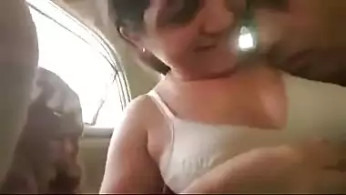 Sexy bhabhi lets her horny driver suck her boobs in the car