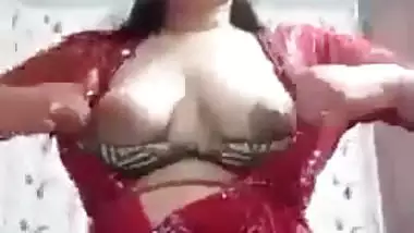 Sexy girl shows her boobs and ass to striptease her BF