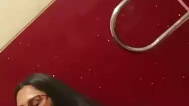 Chubby girl gives an outdoor blowjob in a cinema theatre